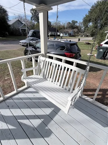 a view of roof deck with patio