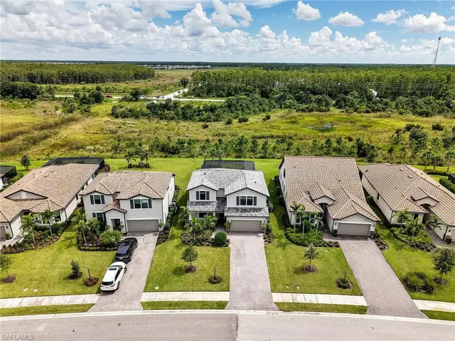 an aerial view of a house with a garden