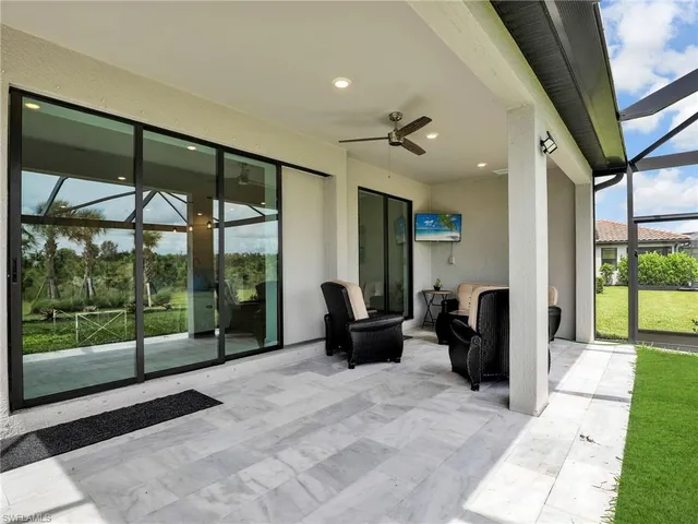 a lobby with furniture and windows