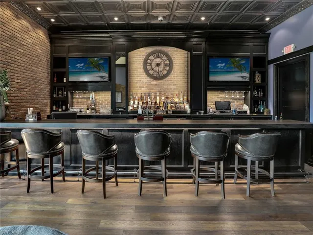 a kitchen with a table and chairs in it