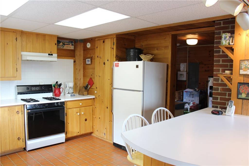 484 Duck Cove Road Roque Bluffs, ME 04654 - Photo 13 of 34 Bright open kitchen with room for...