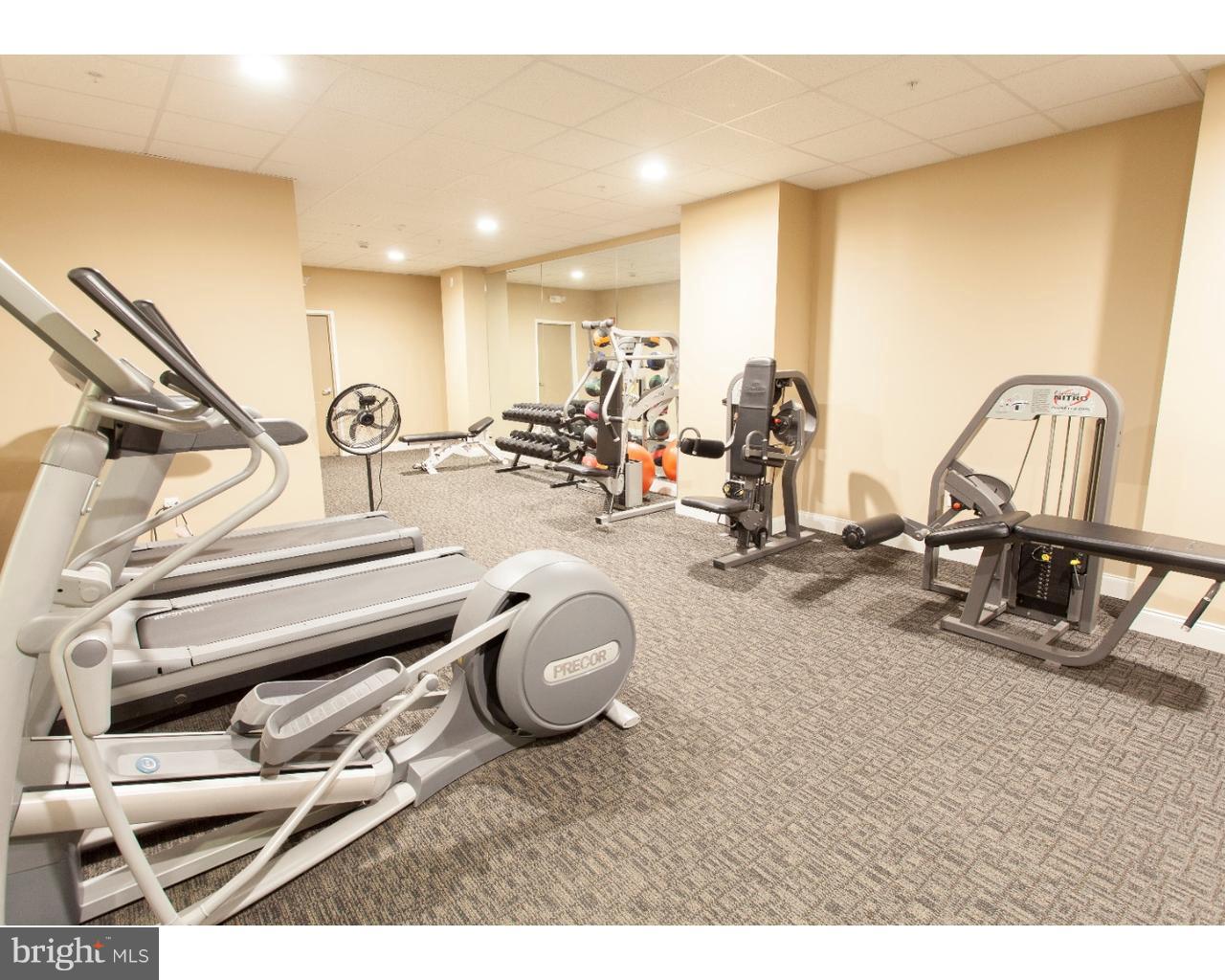 2130 Arch Street, Unit 103 Philadelphia, PA 19103 - Photo 19 of 25 a view of a room with gym equipment
