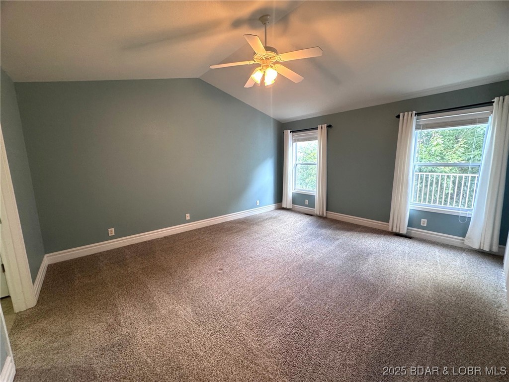 4331 Sunset Drive, Unit B Osage Beach, MO 65065 - Photo 13 of 36 Nice size primary suite-vaulted ceilings