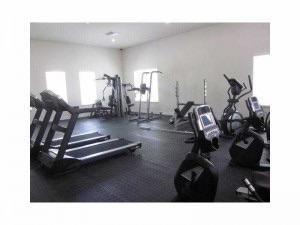 724 Southwest 2nd Way Pompano Beach, FL 33060 - Photo 11 of 13 a picture of a room with gym equipment
