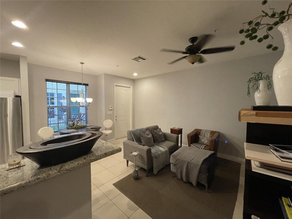 724 Southwest 2nd Way Pompano Beach, FL 33060 - Photo 4 of 13 a living room with furniture and a window