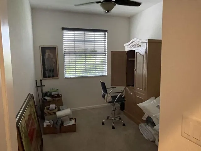 a room with furniture and a window