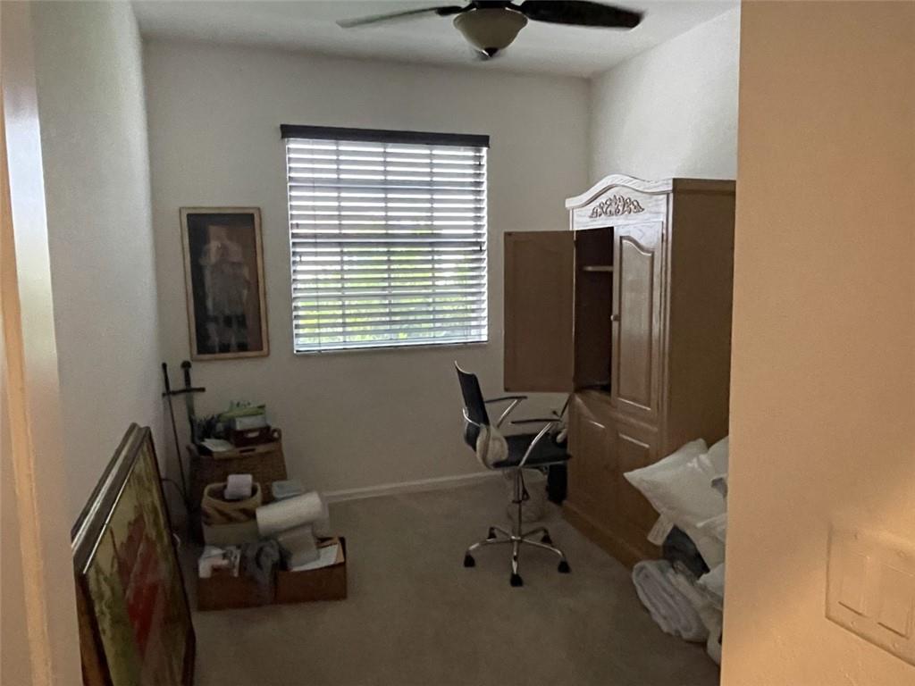 724 Southwest 2nd Way Pompano Beach, FL 33060 - Photo 8 of 13 a room with furniture and a window