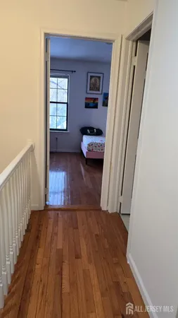 a view of livingroom with furniture and wooden floor