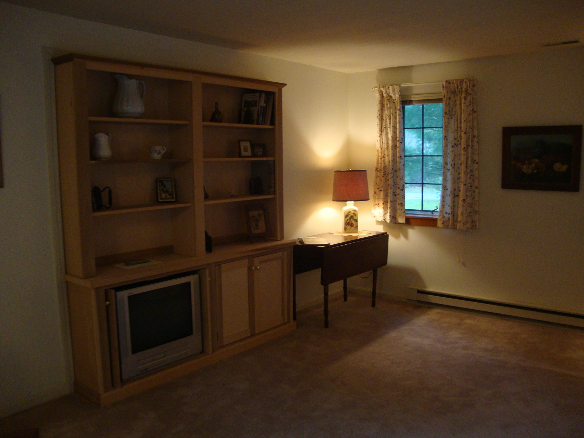 19 Birch Meadow Road, Unit 19 Brunswick, ME 04011 - Photo 8 of 16 Living room with built-in bookcase