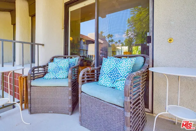 a view of an outdoor space with seating area