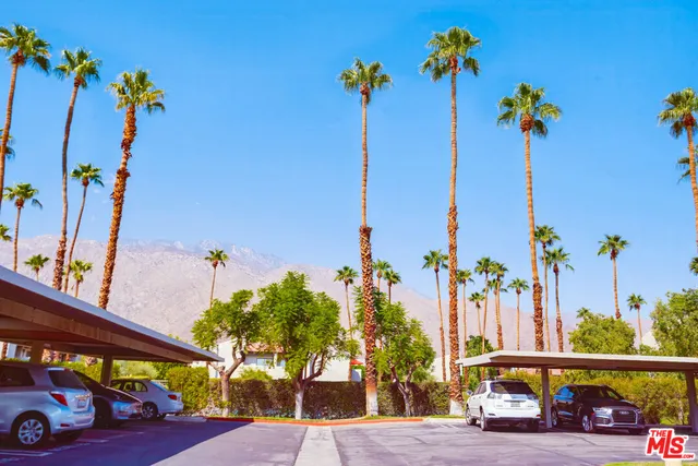 a view of a street with cars