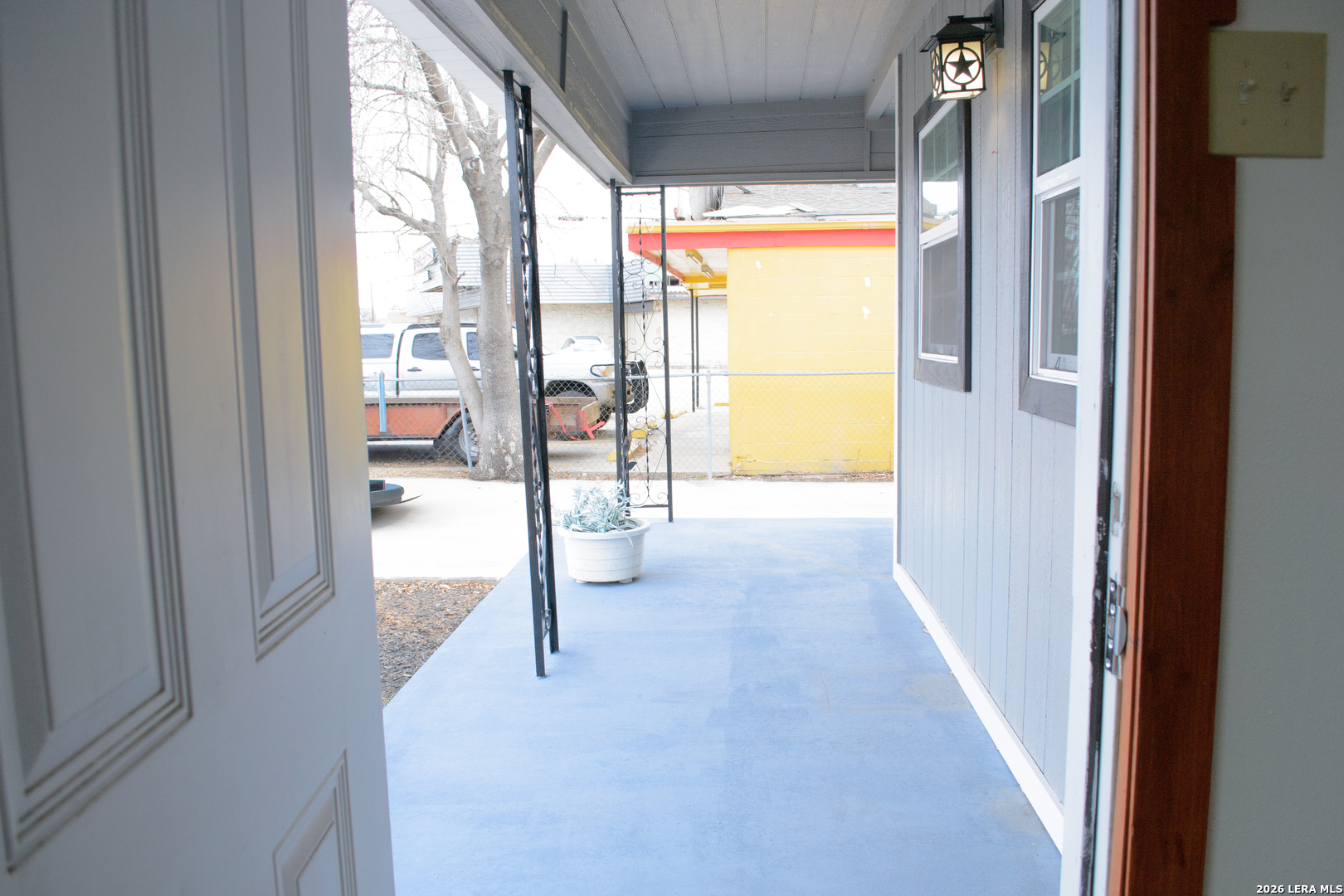 1406 Castroville Road San Antonio, TX 78237 - Photo 4 of 19 a view of hallway with furniture and floor to ceiling window