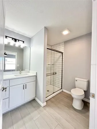 a view of room window and wooden floor