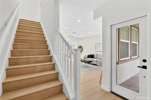 an empty room with wooden floor