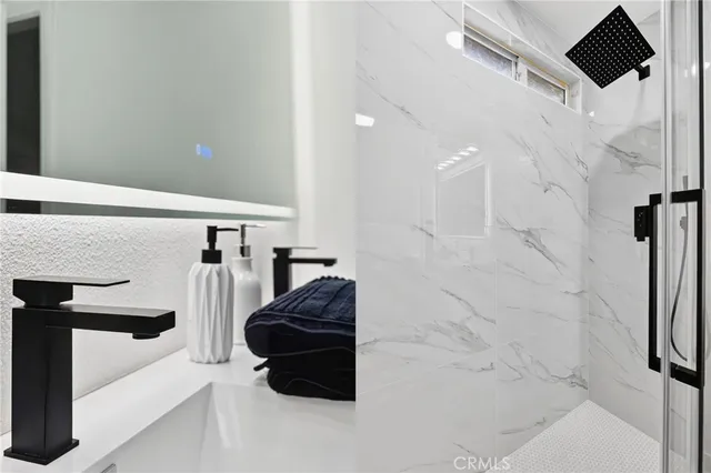 a bedroom with bed and window