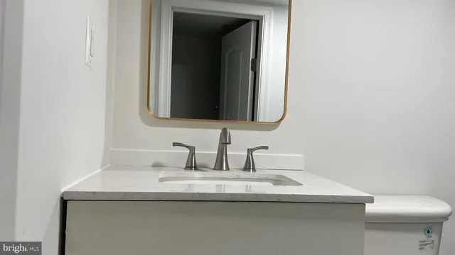 a bathroom with a sink and a toilet