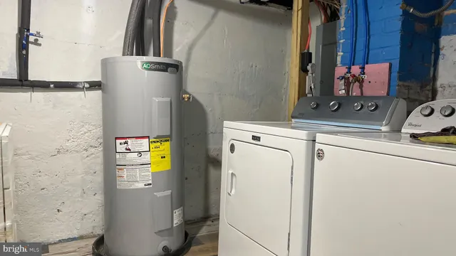 a utility room with dryer and washer