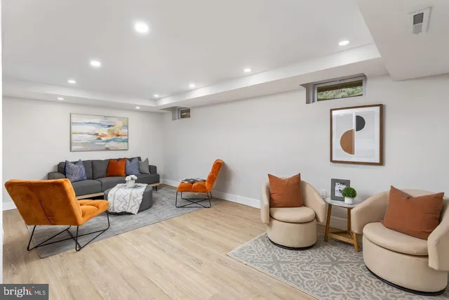 a living room with furniture and a couch