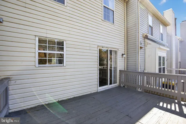 a view of a house with a small white house
