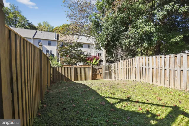 a view of a wrought iron fences in front of house