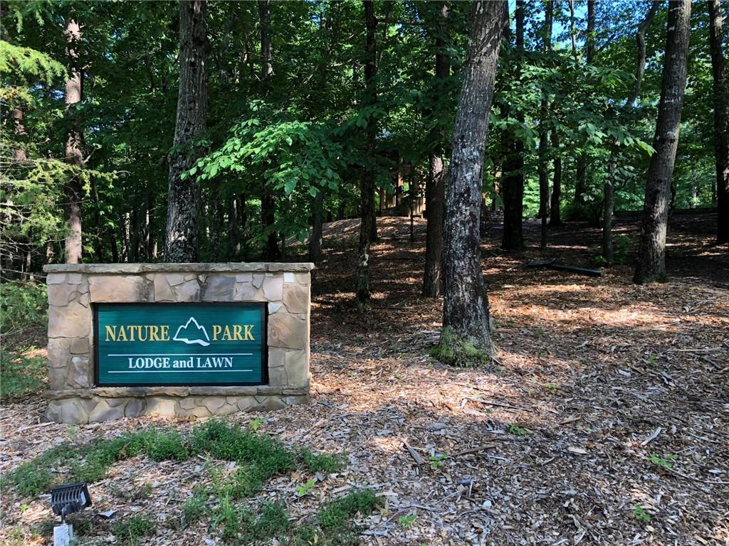 0 Talley Cove Road Jasper, GA 30143 - Photo 8 of 14 a view of outdoor space with sign board and trees