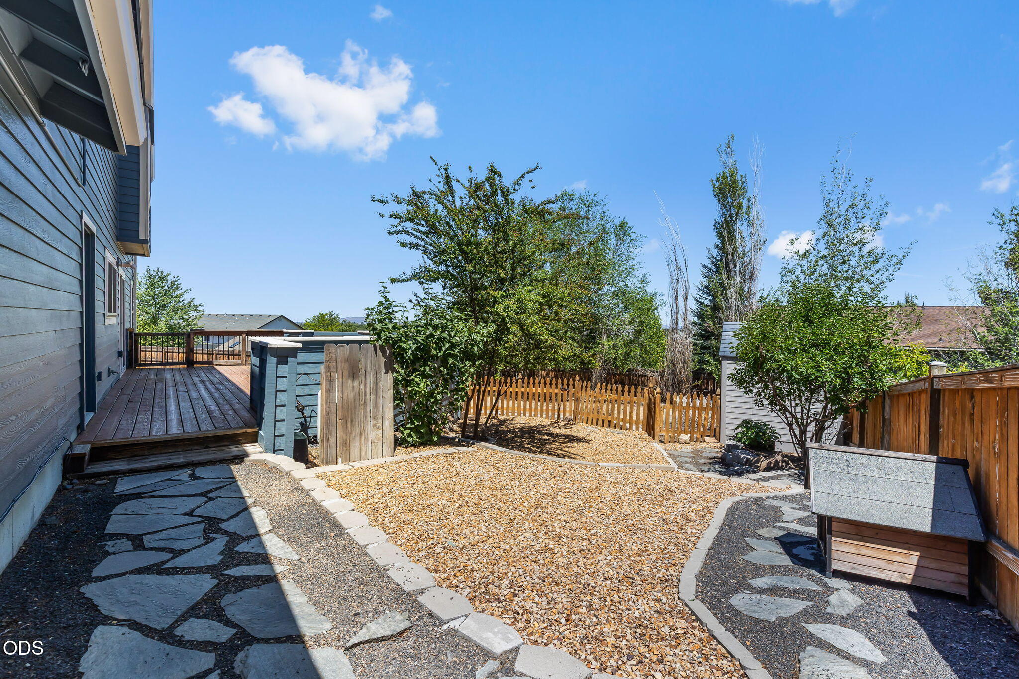 2486 Southwest Valleyview Drive Redmond, OR 97756 - Photo 43 of 55 a view of a backyard with sitting area