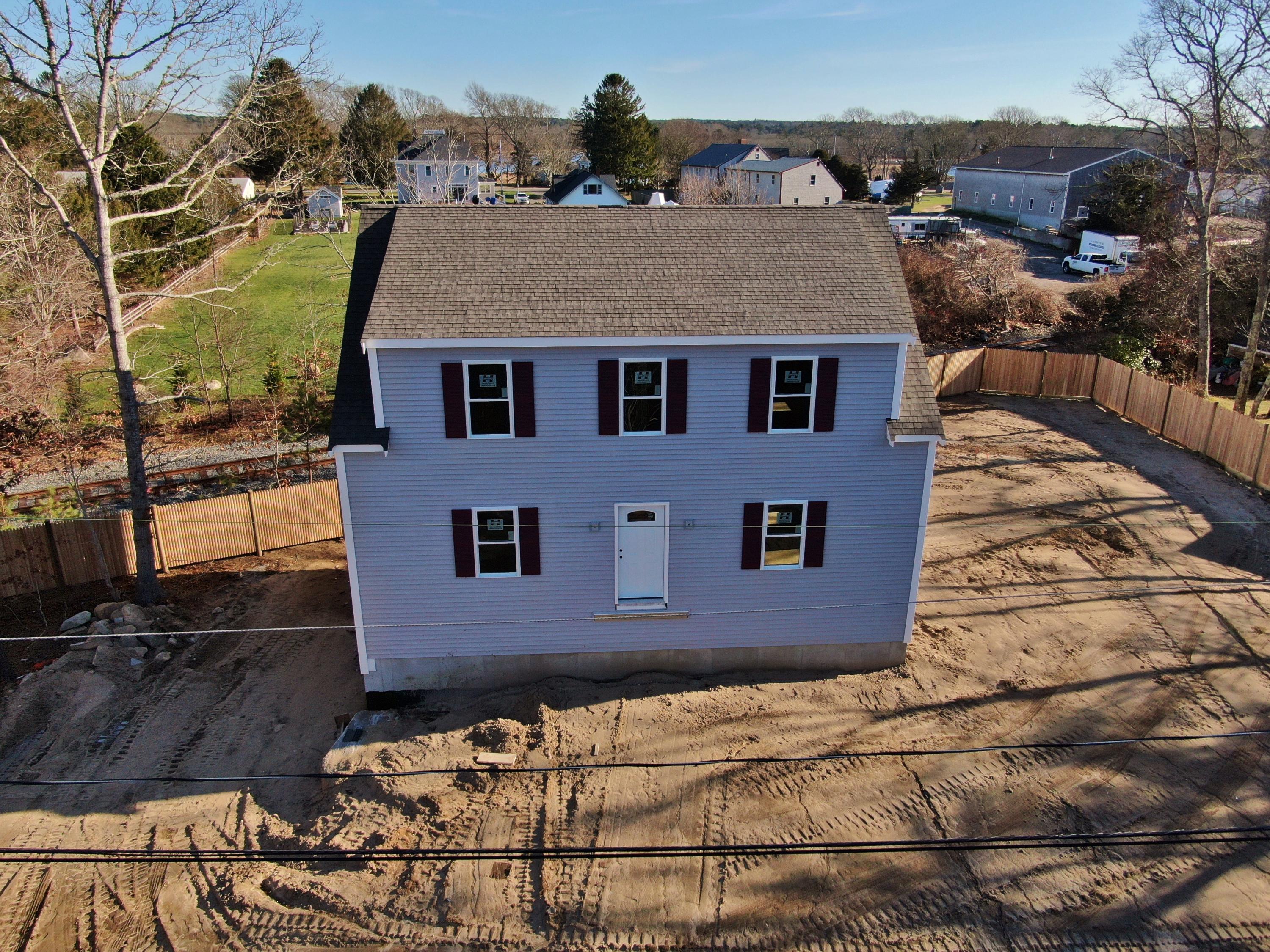 49 Monument Neck Road Buzzards Bay, MA 02532 - Photo 1 of 24 an aerial view of a house