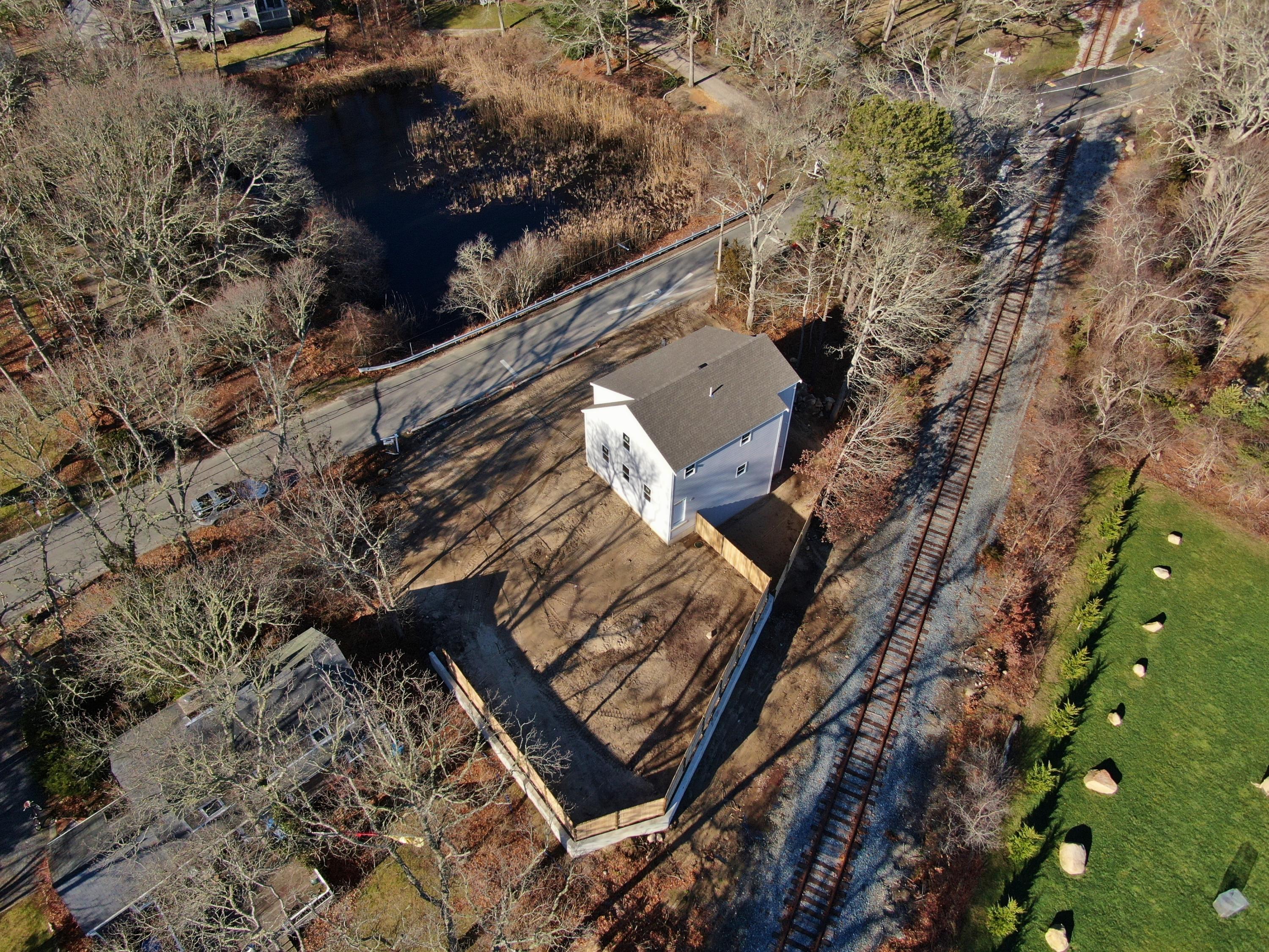 49 Monument Neck Road Buzzards Bay, MA 02532 - Photo 14 of 24 a view of a backyard of the house