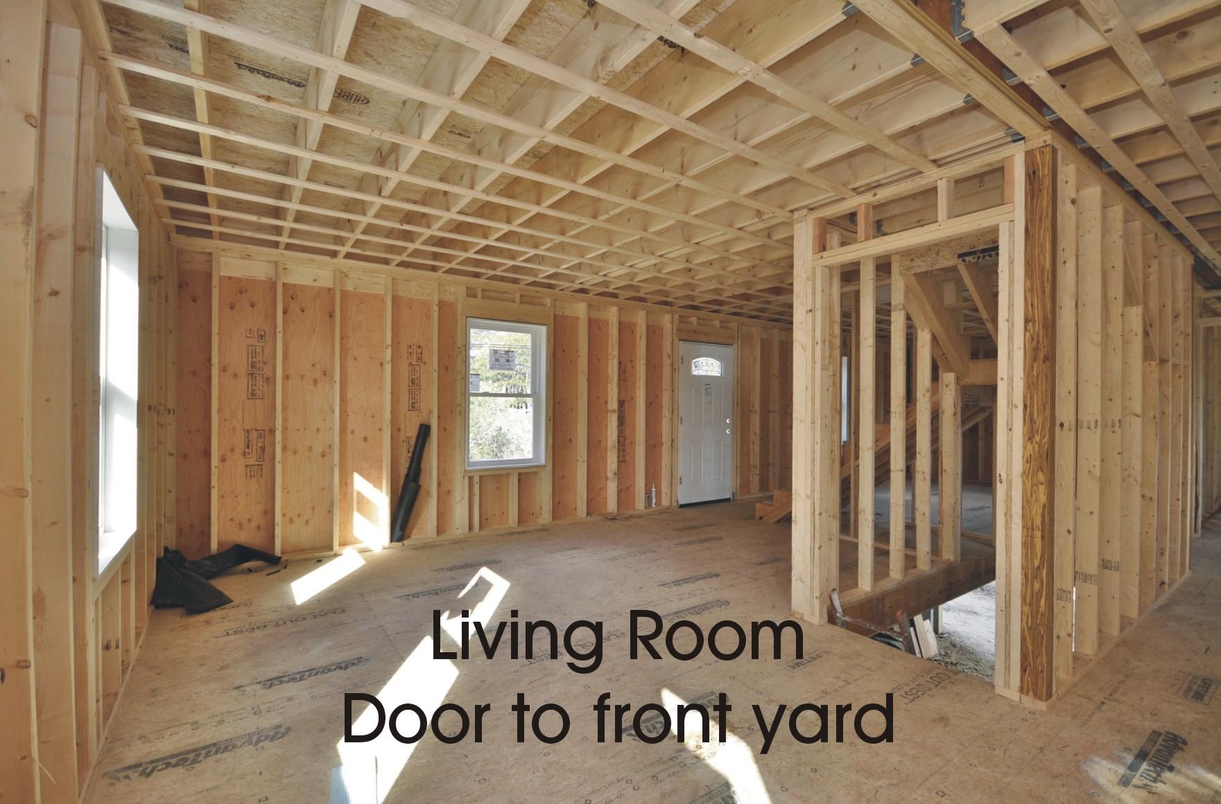 49 Monument Neck Road Buzzards Bay, MA 02532 - Photo 6 of 24 a view of a room with a door and wooden floor