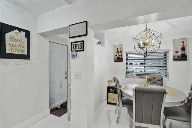 a workspace with furniture and window