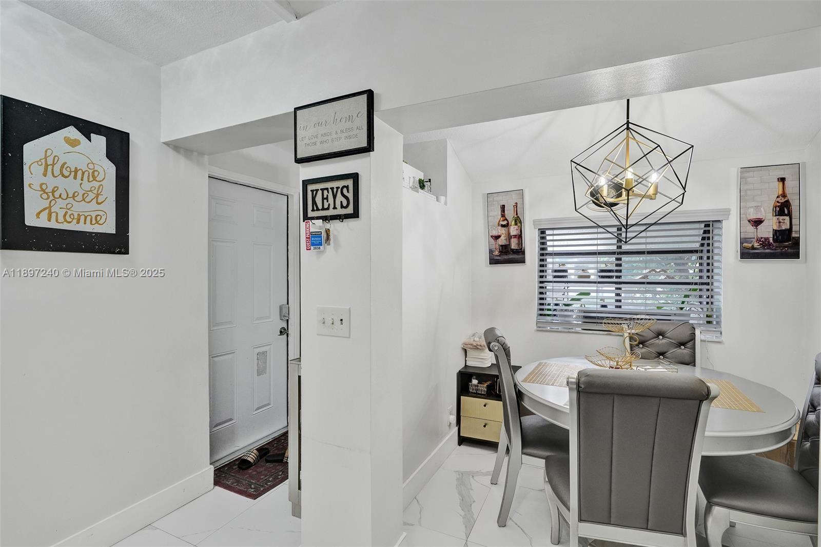 7780 Northwest 79th Avenue, Unit F6 Tamarac, FL 33321 - Photo 6 of 27 a workspace with furniture and window