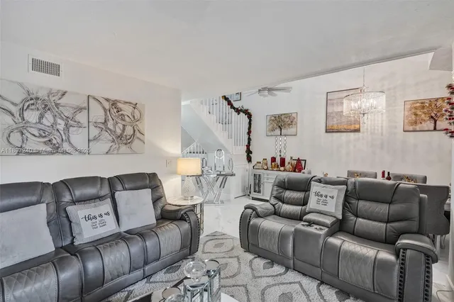 a living room with furniture and a couch