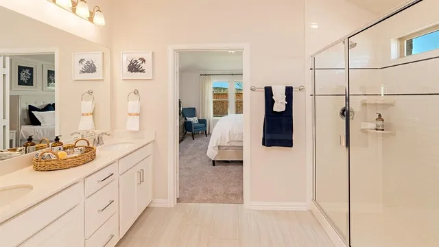 a bathroom with a sink a mirror and vanity
