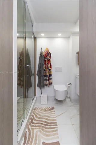 a bathroom with a sink and a toilet