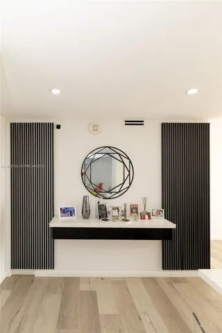 a living room with a wooden floor