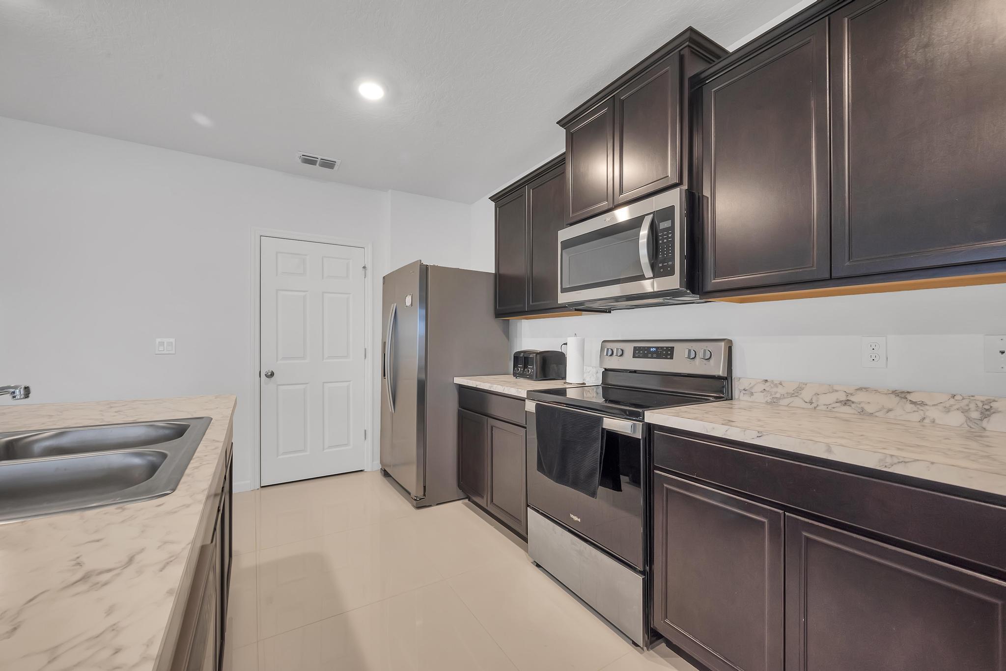 3205 Trinity Circle Fort Pierce, FL 34945 - Photo 9 of 52 9B9DBF7A-EB7D-4FAA-AE02-66FC8F3FD9A0