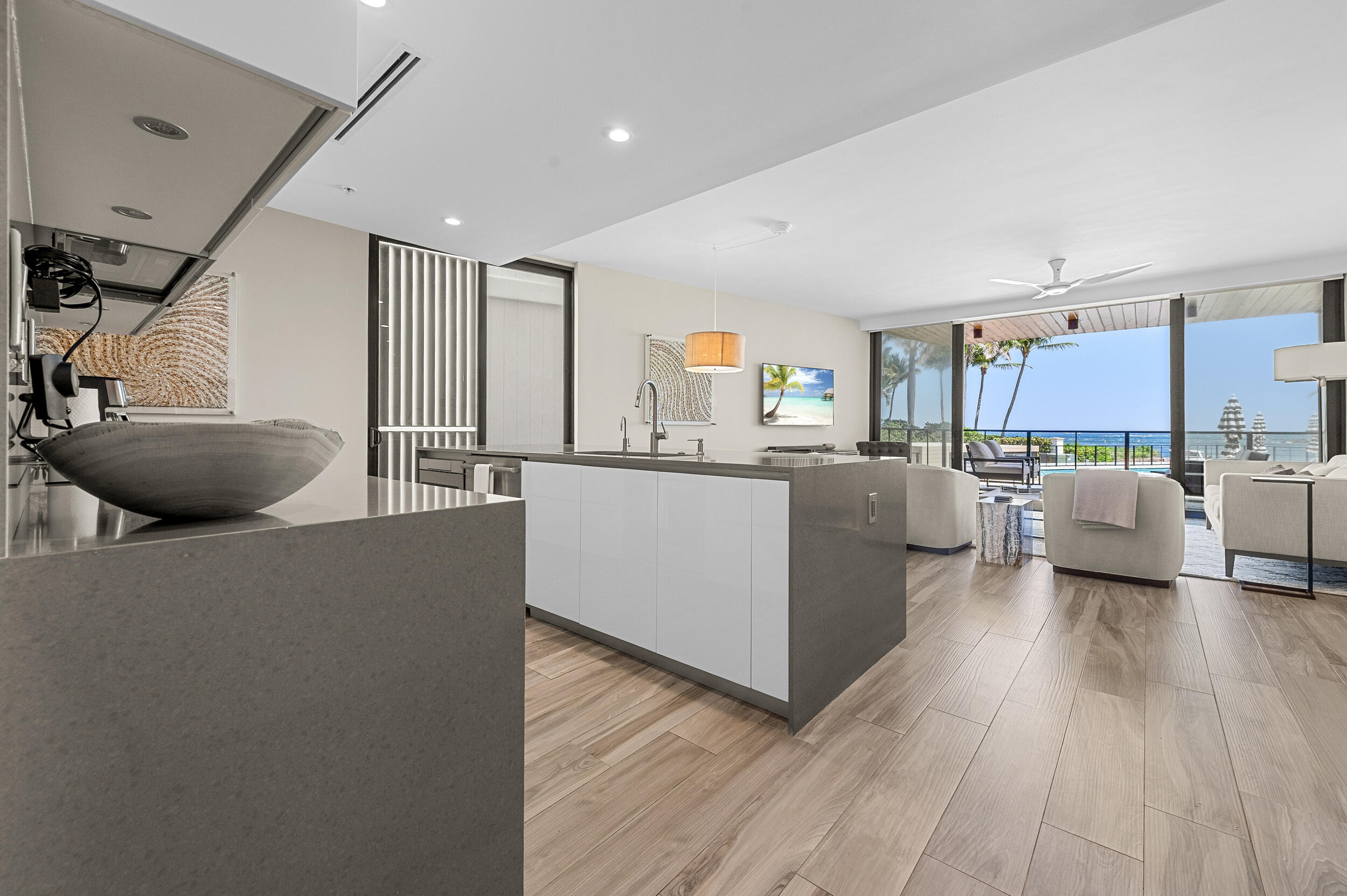106 Inlet Way, Unit 103 Singer Island, FL 33404 - Photo 11 of 29 a living room with furniture and a wooden floor