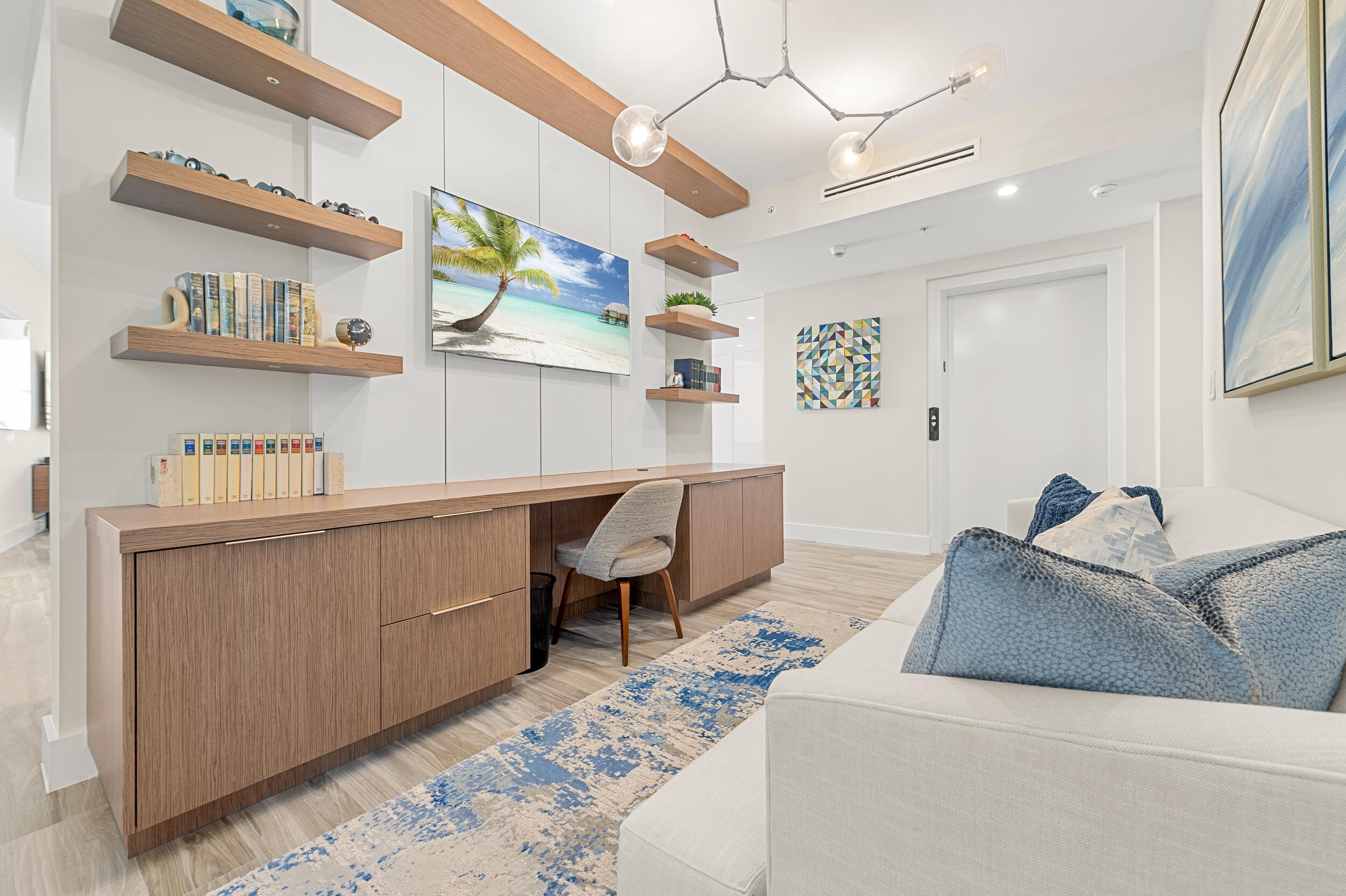 106 Inlet Way, Unit 103 Singer Island, FL 33404 - Photo 15 of 29 a living room with furniture and a table