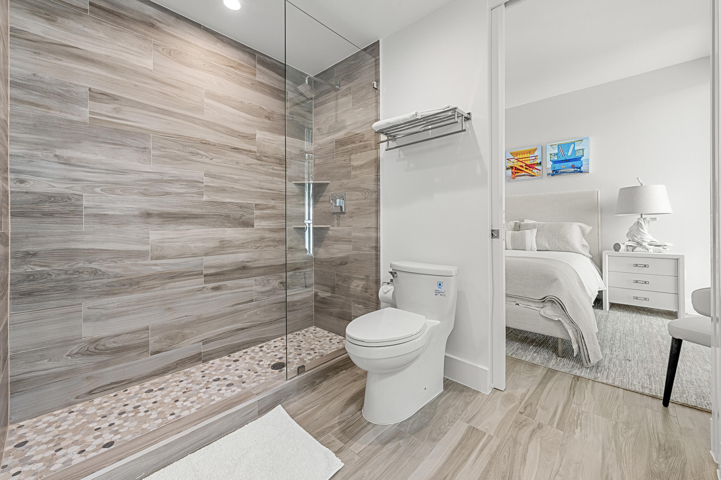 106 Inlet Way, Unit 103 Singer Island, FL 33404 - Photo 18 of 29 a bathroom with a toilet and a shower