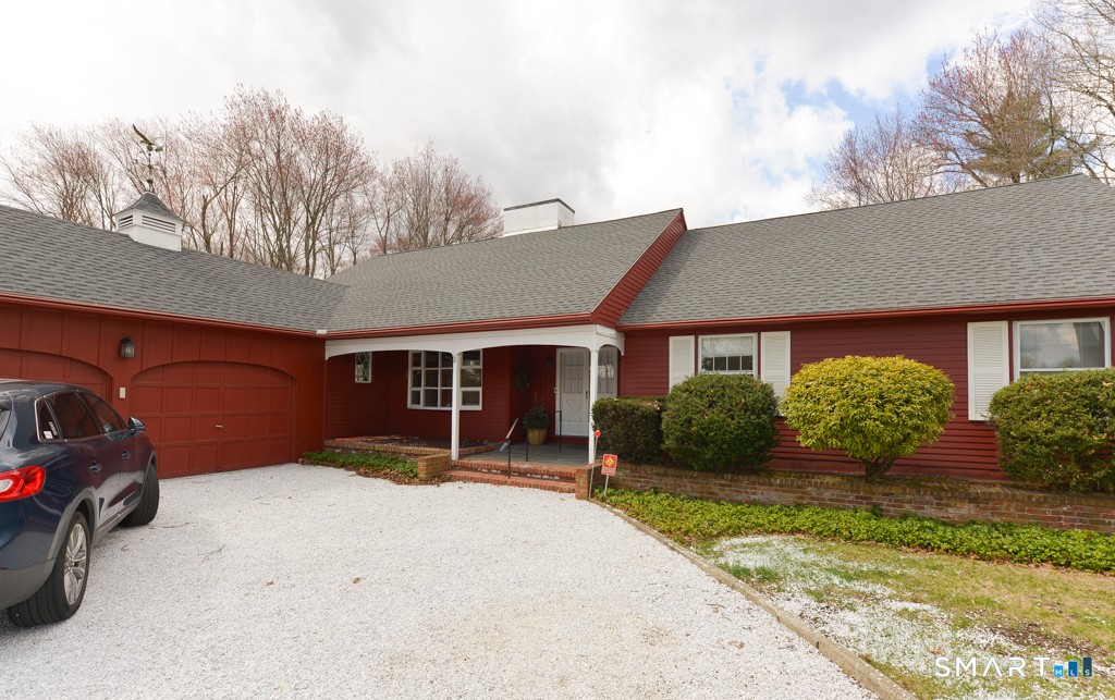 174 SW Road Waterbury, CT 06708 - Photo 17 of 17 a front view of a house with a yard and garage