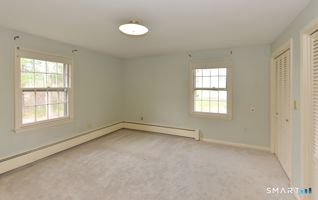 174 SW Road Waterbury, CT 06708 - Photo 9 of 17 an empty room with a window