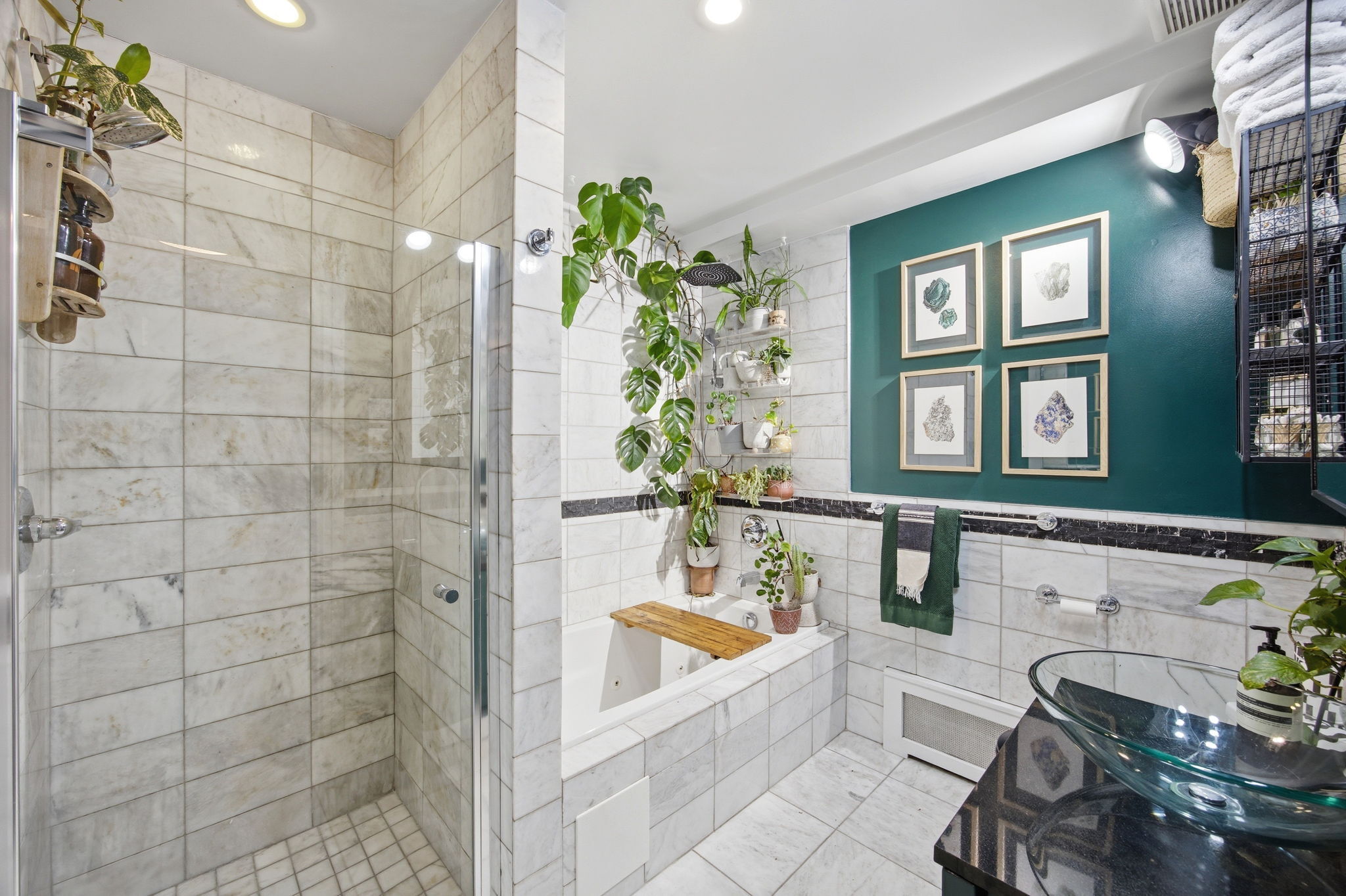 175 12th Street, Unit 4B Brooklyn, NY 11215 - Photo 13 of 27 a bath room with a bathtub and a shower