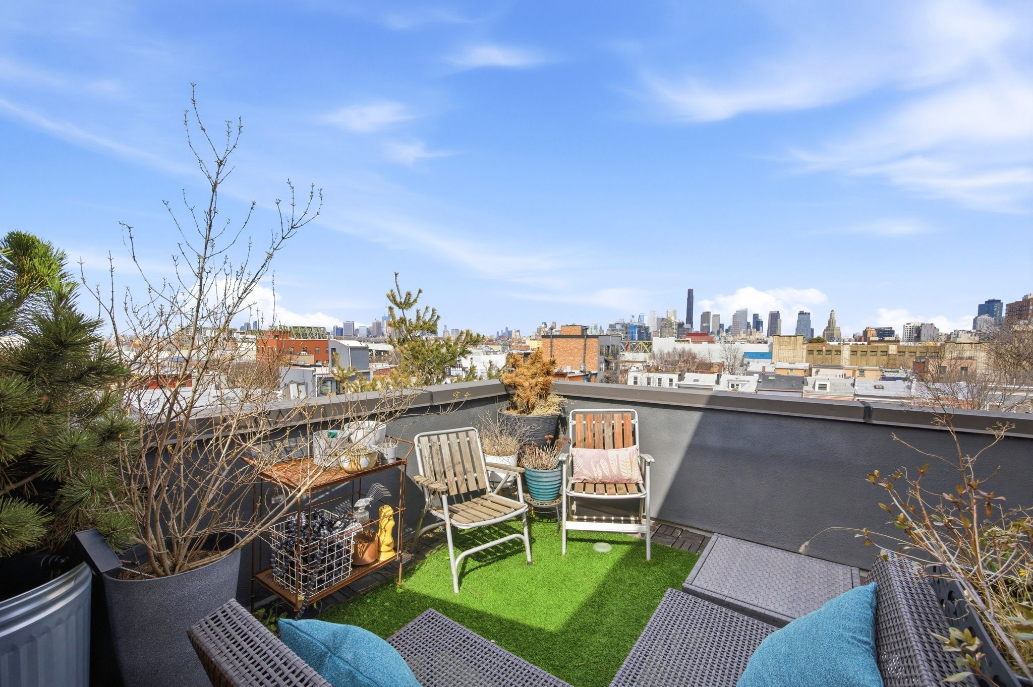 175 12th Street, Unit 4B Brooklyn, NY 11215 - Photo 20 of 27 a view of a balcony with chairs and a table