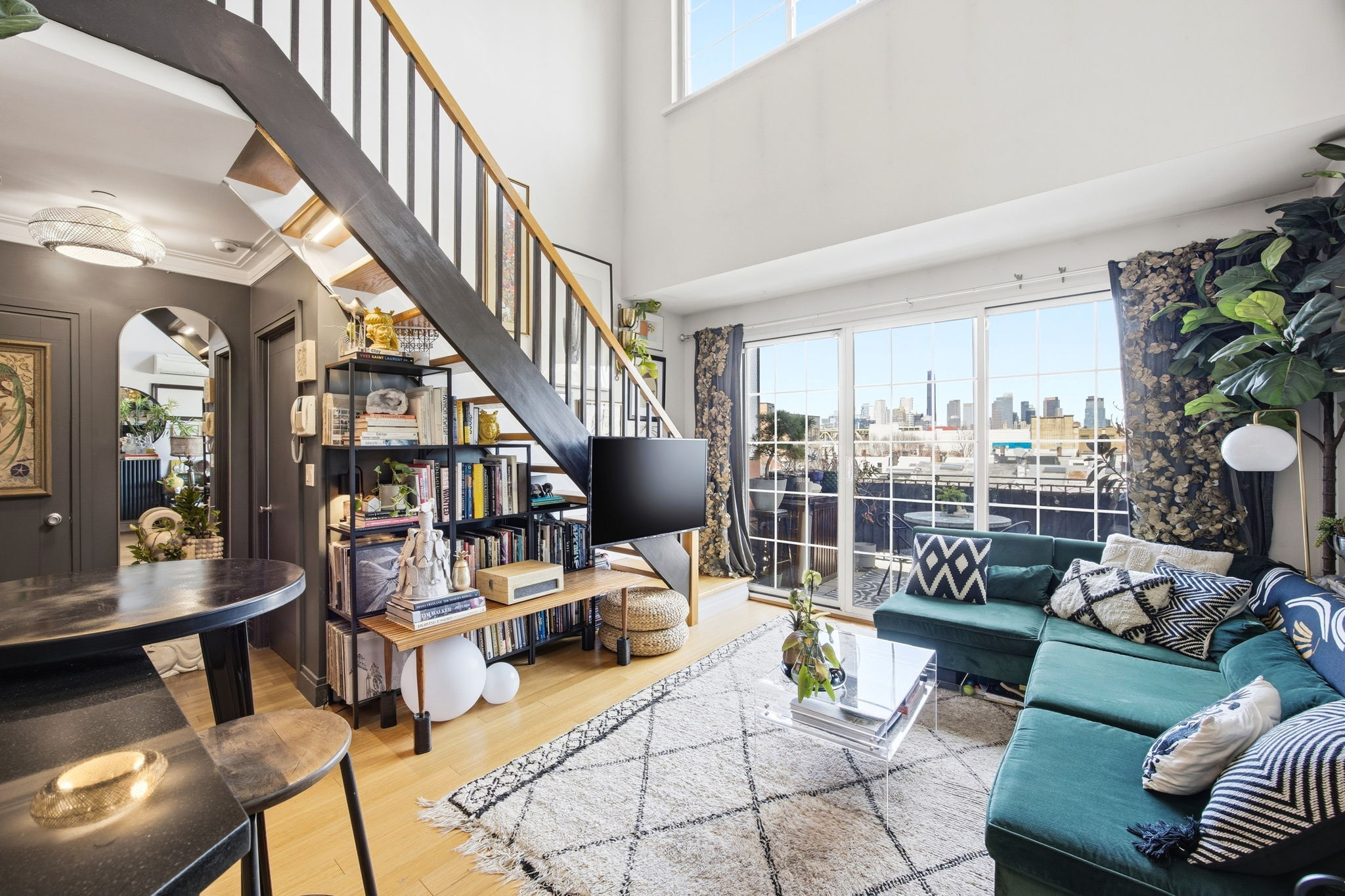 175 12th Street, Unit 4B Brooklyn, NY 11215 - Photo 2 of 27 a living room with furniture and a large window