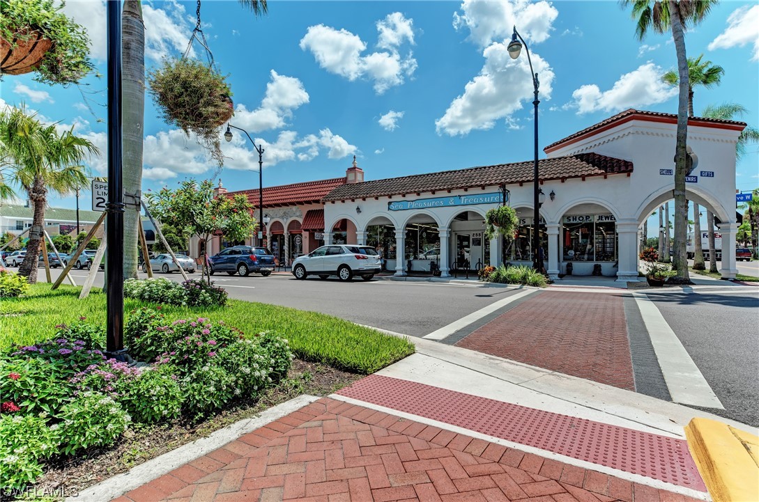451010084 Terrapin Road Venice, FL 34293 - Photo 12 of 14 a view of a building and a yard in front of it