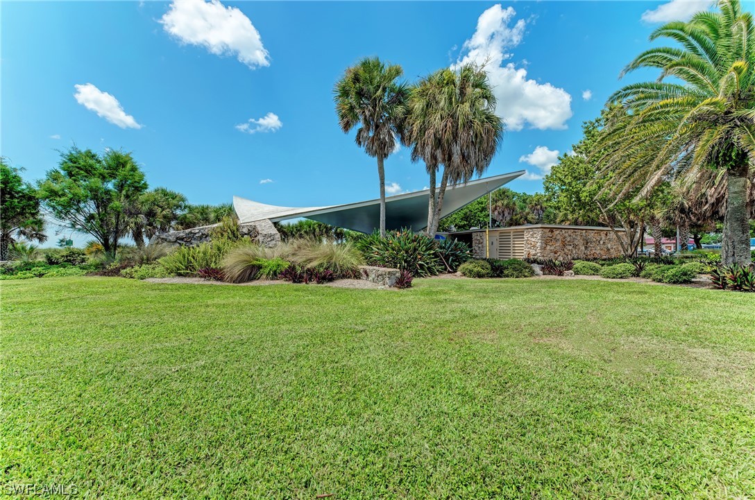451010084 Terrapin Road Venice, FL 34293 - Photo 7 of 14 a view of a backyard with a garden