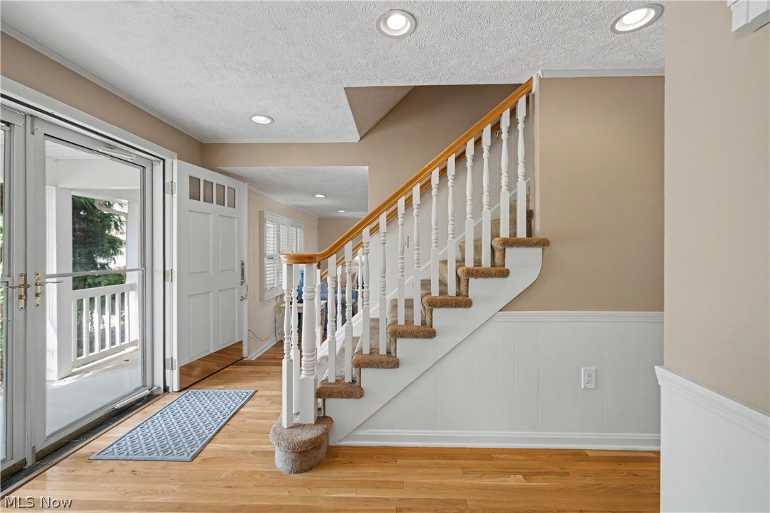 1300 Lake Road Conneaut, OH 44030 - Photo 29 of 45 Central hall entry and stairs to 3 more bedrooms and 2 full baths