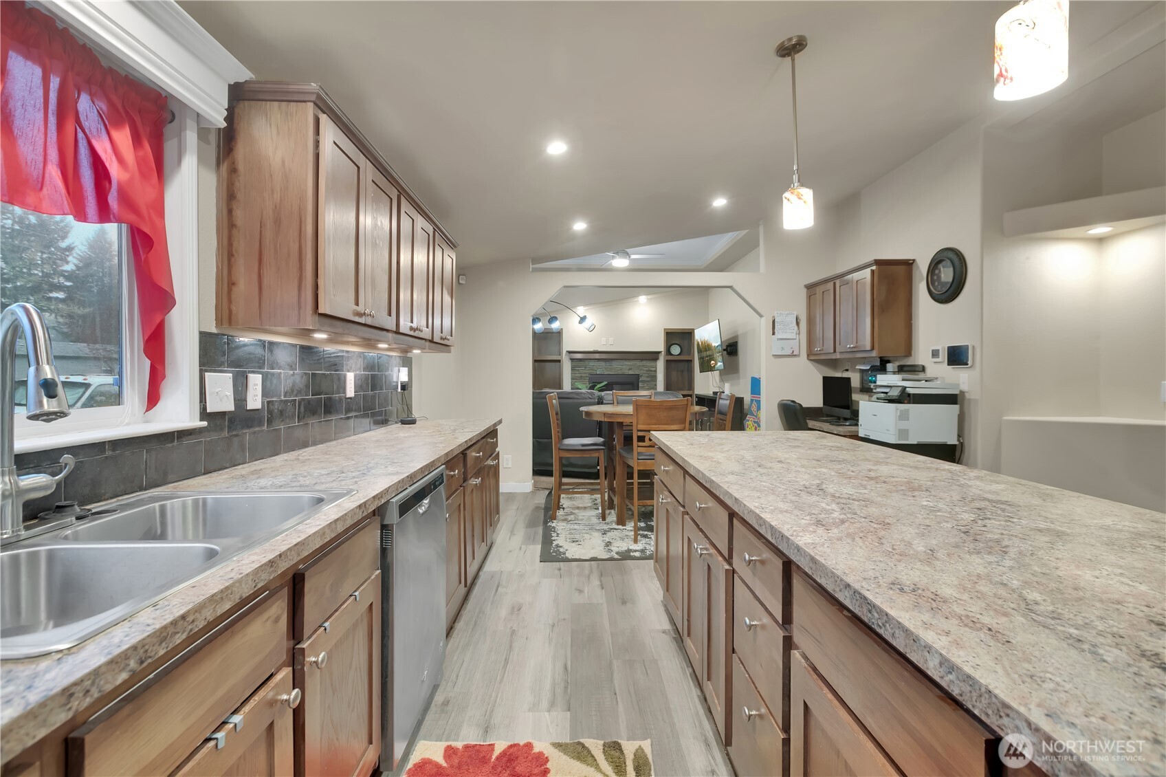 439 Duterrow Road Southeast, Unit 14 Olympia, WA 98513 - Photo 9 of 25 a kitchen with a sink stove and cabinets