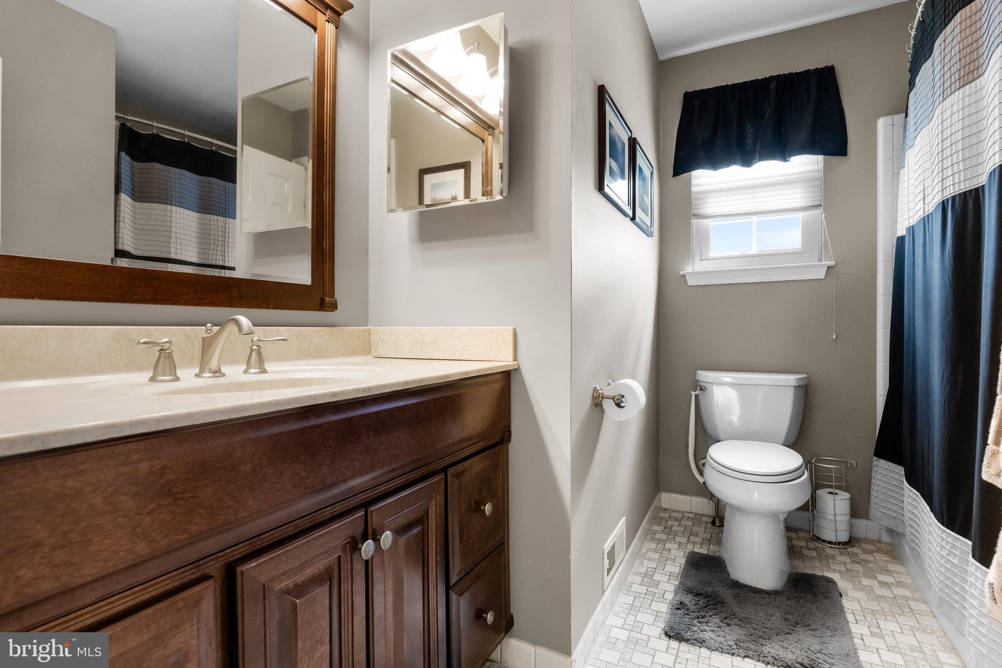 4 Utica Road Marlton, NJ 08053 - Photo 36 of 42 a bathroom with a sink toilet and a mirror