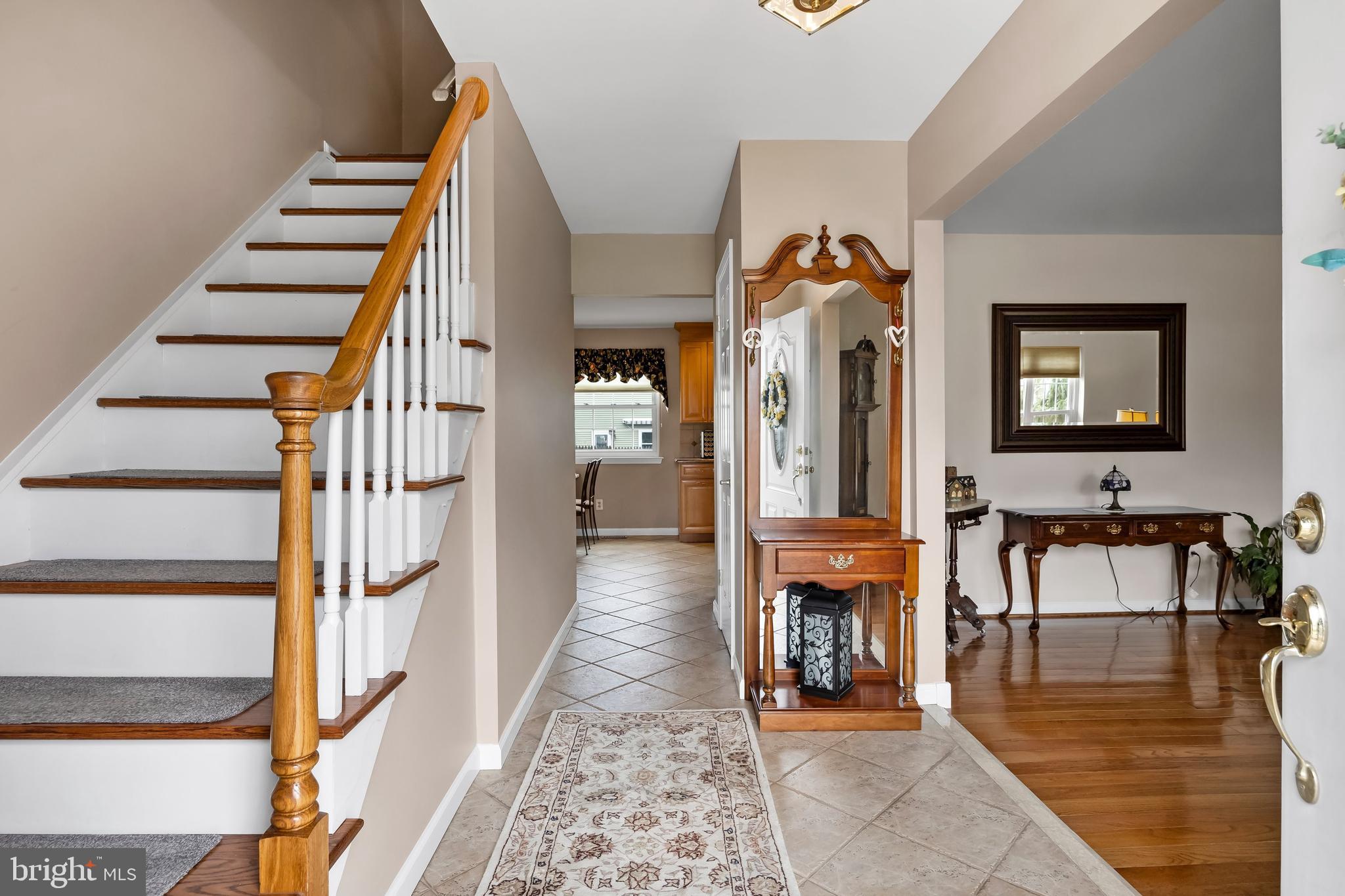4 Utica Road Marlton, NJ 08053 - Photo 5 of 42 a view of a hallway with wooden floor fireplace and windows